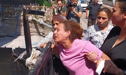 Sel nedeniyle evinde çocuğuyla mahsur kalan kadın sinir krizi geçirdi