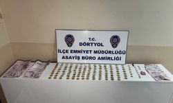 Çaldıkları altın dolu keseyi toprağa sakladılar.